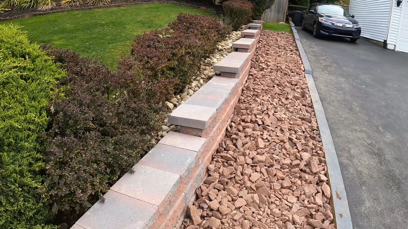 Properly constructed concrete steps and retaining wall showing quality workmanship