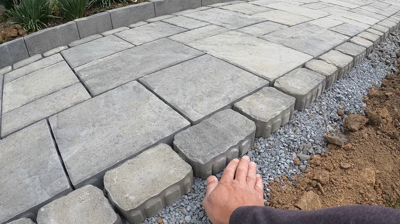 Expertly installed decorative concrete patio with multi-tone pavers